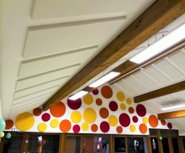 Ambiance Design - Ambiance design color posé au mur par collage en forme de cercles